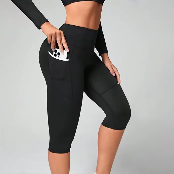 Pantalons de yoga taille haute Leggings capri avec poches pour femmes Leggings capri d'entraînement
