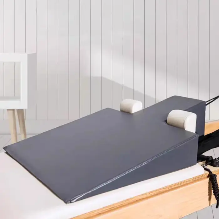 Bloc de rehaussement pour machine Pilates Reformer