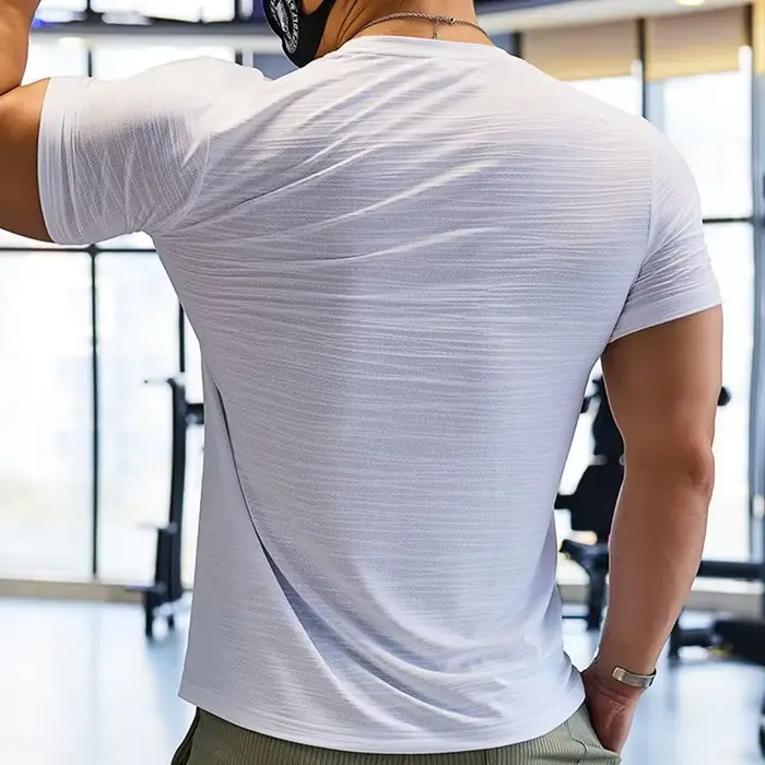 Entraînement musculaire Compression T-shirt homme course coupe sèche T-shirt couleur unie grande tai