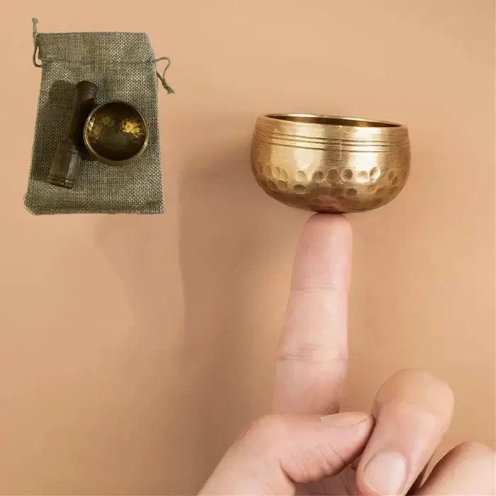 Mini bol chantant tibétain en laiton fait à la main