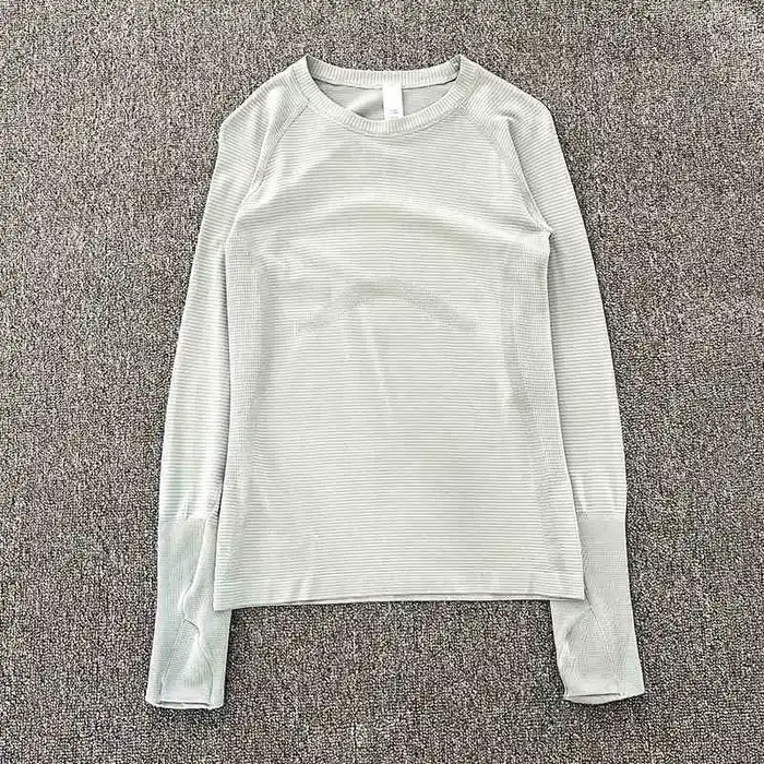 Haut de vêtements de Yoga pour femmes au printemps et en automne, coupe slim, manches longues, cours