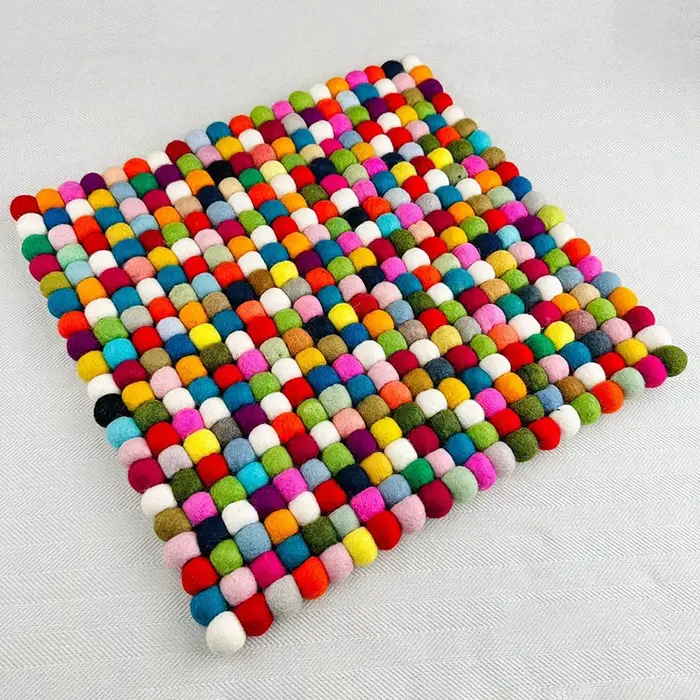 Tapis de bol chantant en feutre de laine