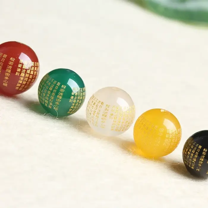 Perles de mantra Manjushri en agate mousse